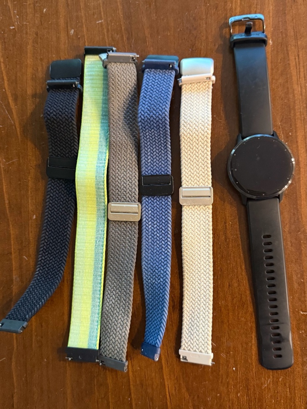 Garmin Venu3 SmartWatch with charging cable and 6 bands
